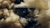 Volvo truck engulfed in dust clouds during high-speed off-road driving