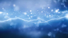 Blue abstract background with glowing lightning bolts and bokeh light particles