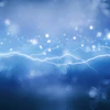 Blue abstract background with glowing lightning bolts and bokeh light particles