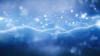 Blue abstract background with glowing lightning bolts and bokeh light particles