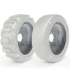 Two industrial tire wheels displayed side by side showing tread and smooth tire designs