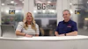 Two professionals at a broadcast desk during The Big Show Coverage event, with CAT sponsorship backdrop visible