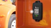 S300 GPS tracker device mounted on orange construction trailer with QR code and serial number
